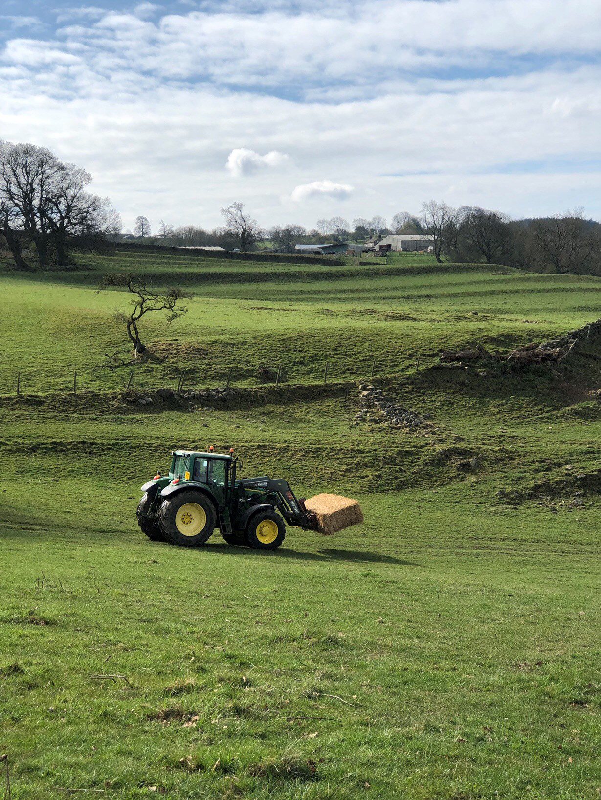 Moving the straw bales around with the front loader