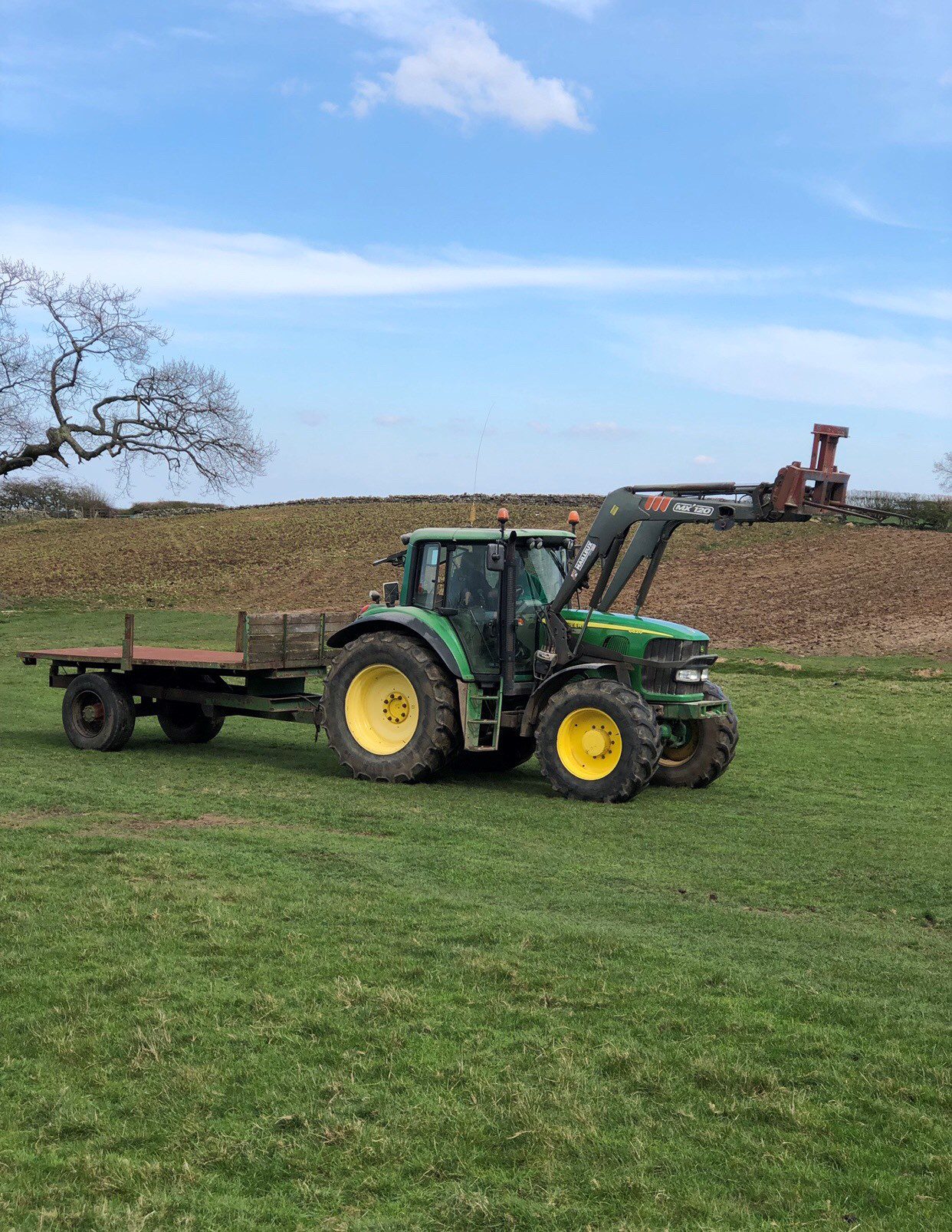 Front loader on and trailer on!