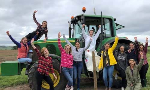 The groups love to get stuck in with the tractor racing!